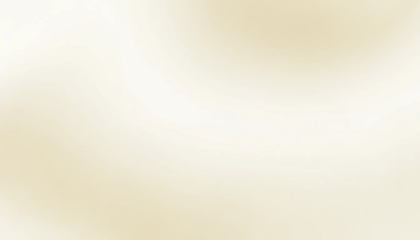A soft macro of brushed yellow gold, pale and low contrast.