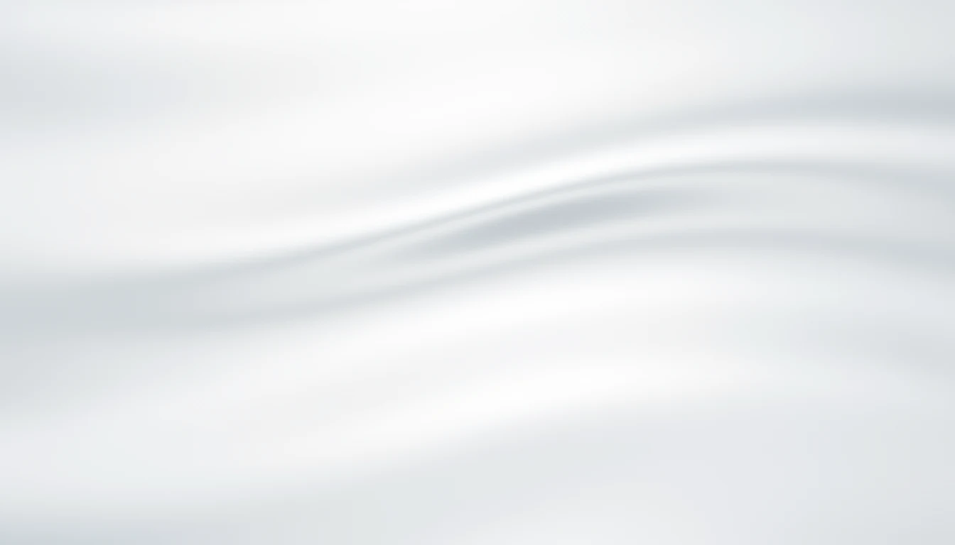 A soft macro of polished platinum, pale and low contrast.